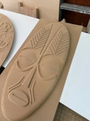 Relief carving with a symmetrical leaf pattern