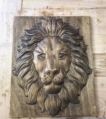 Lion head relief panel